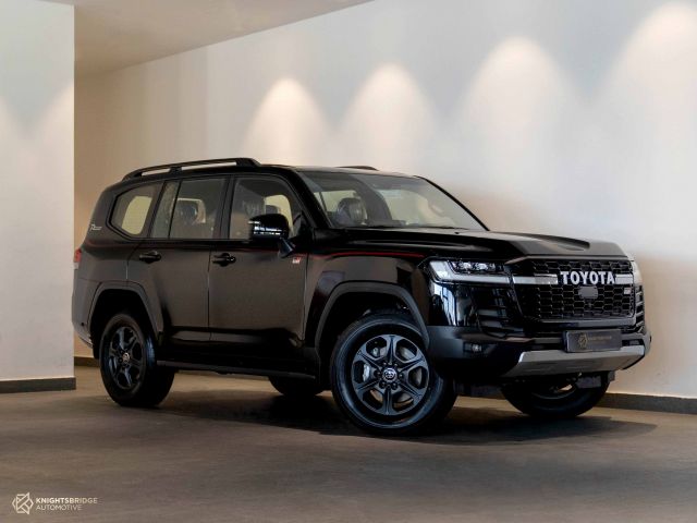 New 2022 Toyota Land Cruiser GR Sport Twin Turbo Black exterior with Red and Black interior at Knightsbridge Automotive