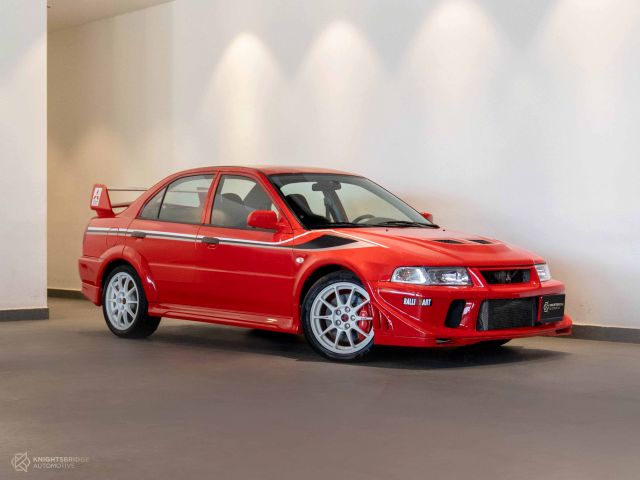 Used - Perfect Condition 2000 Mitsubishi Lancer Evolution 6.5 RS2 Tommi Makinen Red exterior with Red and Black interior at Knightsbridge Automotive