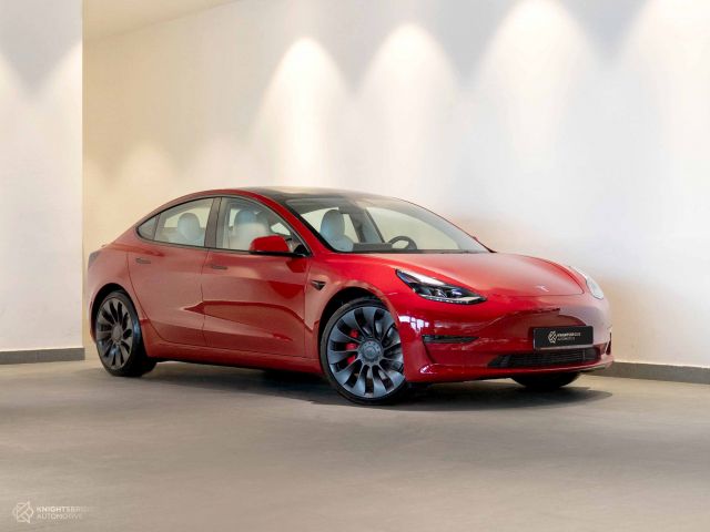 Used - Perfect Condition 2021 Tesla Model 3 Red exterior with White interior at Knightsbridge Automotive