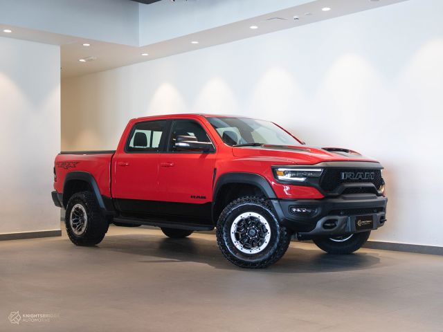 New 2022 Dodge RAM TRX Red exterior with Red and Black interior at Knightsbridge Automotive