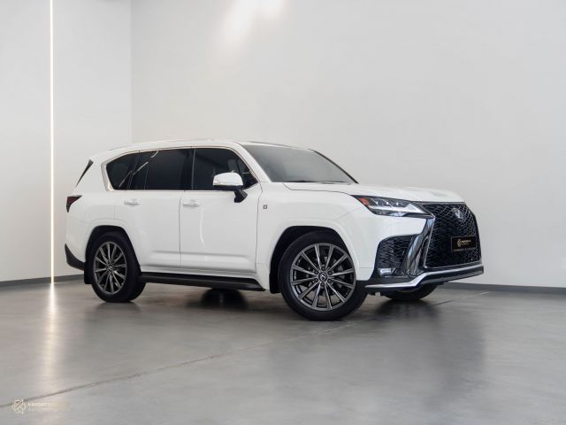 Used - Perfect Condition 2022 Lexus LX 600 F Sport White exterior with Red and Black interior at Knightsbridge Automotive