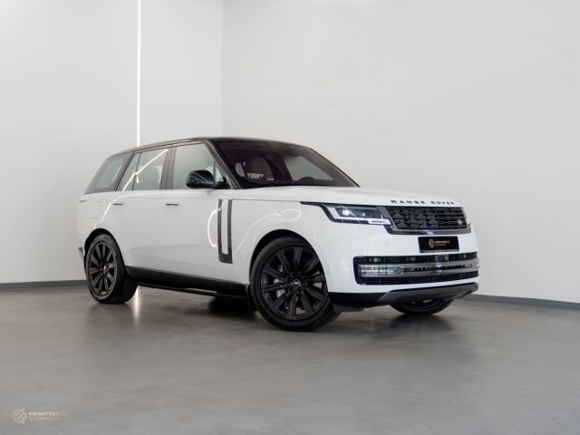 New 2022 Range Rover Vogue HSE White exterior with Brown interior at Knightsbridge Automotive