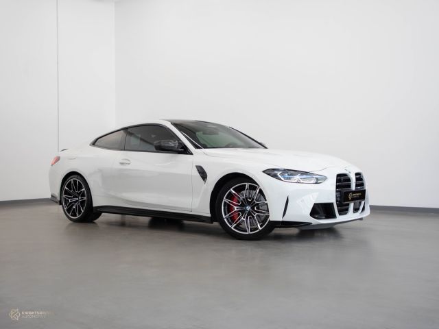 Used - Perfect Condition 2021 BMW M4 Competition White exterior with Orange and Black interior at Knightsbridge Automotive