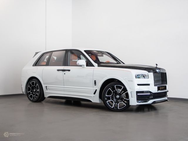 New 2022 Rolls-Royce Cullinan Onyx White exterior with Orange and Black interior at Knightsbridge Automotive