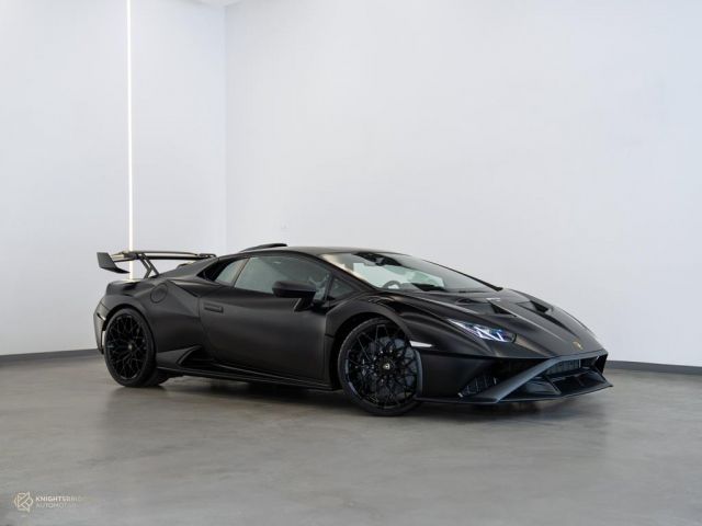 Used - Perfect Condition 2022 Lamborghini Huracan STO Matte Black exterior with Red and Black interior at Knightsbridge Automotive