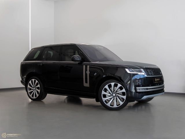 New 2023 Range Rover Vogue HSE Black exterior with White interior at Knightsbridge Automotive