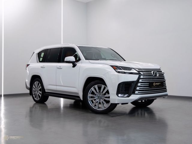 New 2023 Lexus LX 600 White exterior with Orange and Black interior at Knightsbridge Automotive