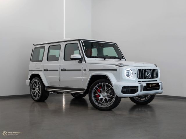 New 2023 Mercedes-Benz G63 AMG White exterior with Red and Black interior at Knightsbridge Automotive