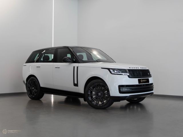 New 2023 Range Rover Vogue HSE White exterior with Maroon interior at Knightsbridge Automotive