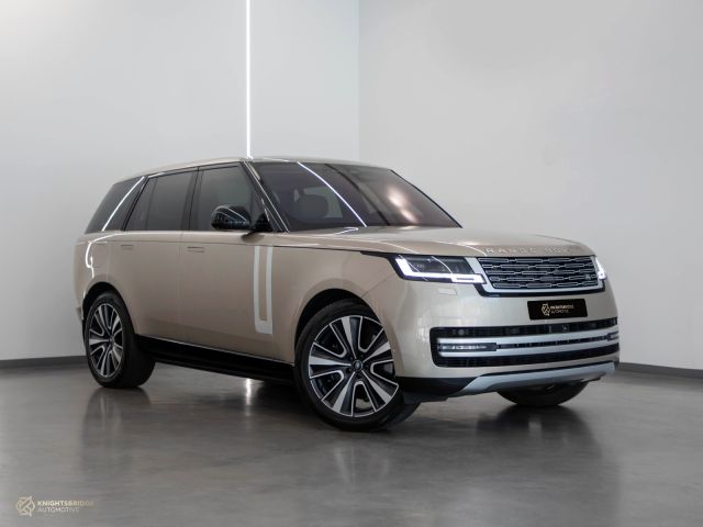 Used - Perfect Condition 2022 Range Rover Vogue First Edition Gold exterior with White interior at Knightsbridge Automotive