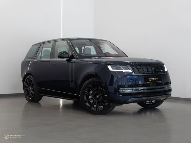 New 2023 Range Rover Vogue HSE Blue exterior with White and Black interior at Knightsbridge Automotive