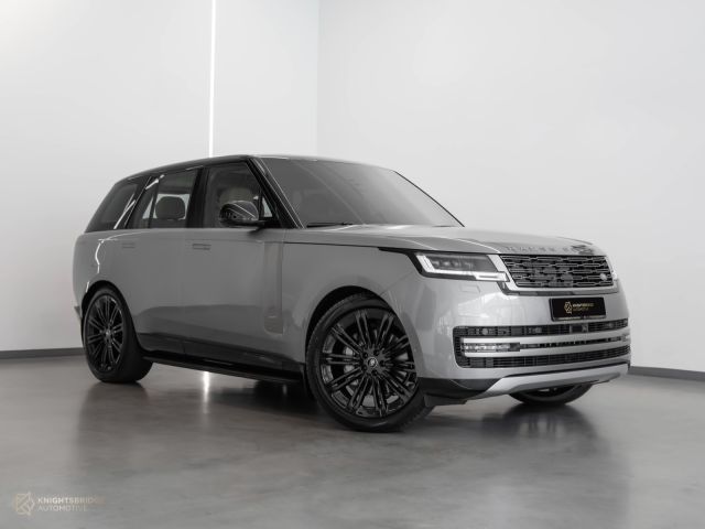 New 2023 Range Rover Vogue SE Silver exterior with Brown and Black interior at Knightsbridge Automotive