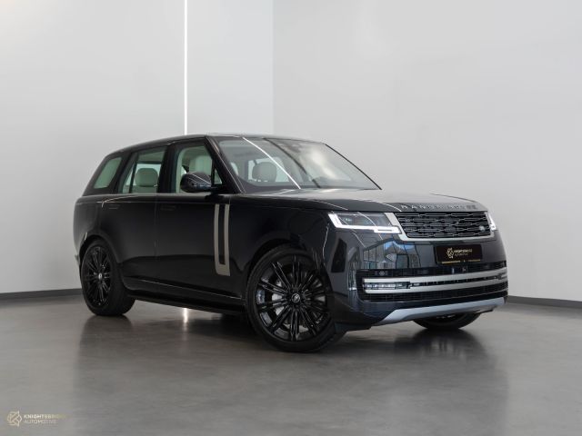 New 2023 Range Rover Vogue HSE Black exterior with White and Black interior at Knightsbridge Automotive