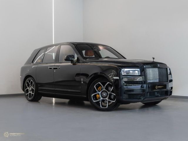 Used - Perfect Condition 2023 Rolls-Royce Cullinan Black Badge Black exterior with Yellow and Black interior at Knightsbridge Automotive