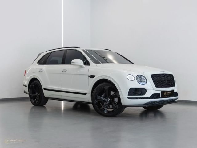Used - Perfect Condition 2019 Bentley Bentayga White exterior with Red and Black interior at Knightsbridge Automotive