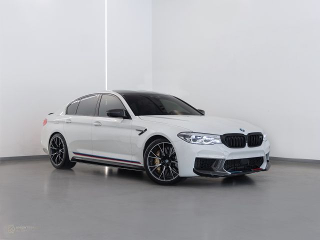 Used - Perfect Condition 2018 BMW M5 Competition White exterior with Orange and Black interior at Knightsbridge Automotive