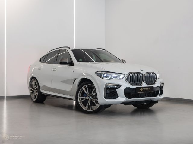 Used - Perfect Condition 2021 BMW X6 M50i White exterior with Red and Black interior at Knightsbridge Automotive