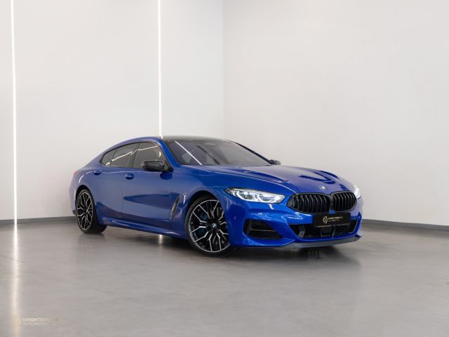 Used - Perfect Condition 2020 BMW M850i Blue exterior with Red and Black interior at Knightsbridge Automotive