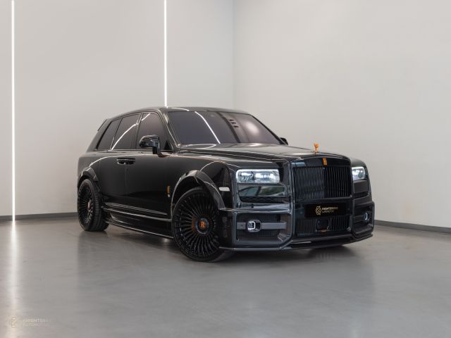 Used - Perfect Condition 2019 Rolls-Royce Cullinan Urban Widetrack Black exterior with Orange and Black interior at Knightsbridge Automotive